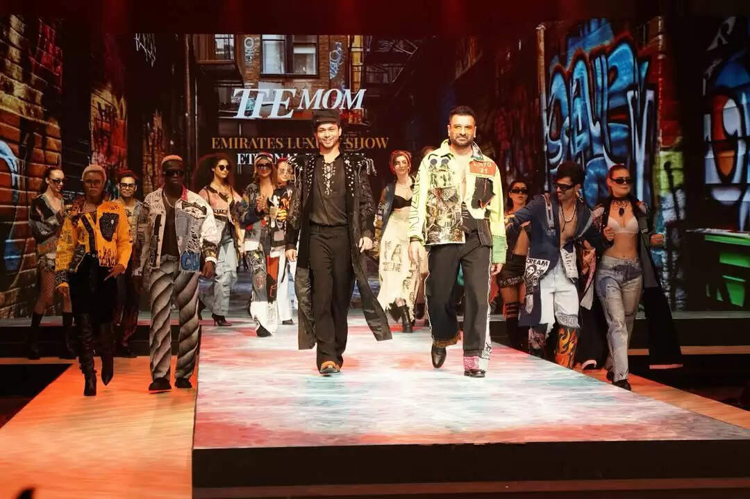 Actor Eijaz Khan walking the ramp at a fashion show in Dubai