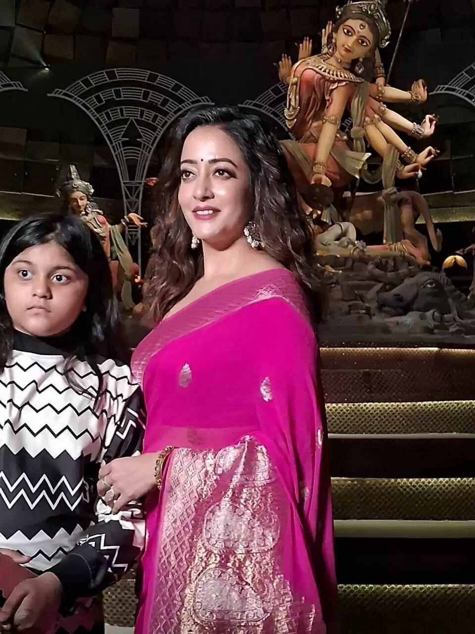 Actress Raima Sen Radiates Elegance in Pink Banarasi Sari During Durga Puja Celebrations